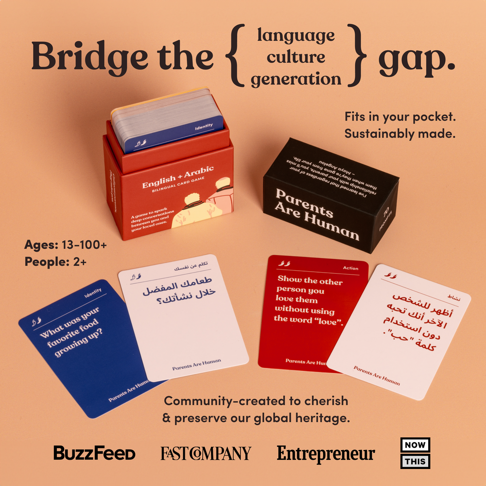 An open Parents Are Human English + Arabic box beside four fanned bilingual cards on a peach background