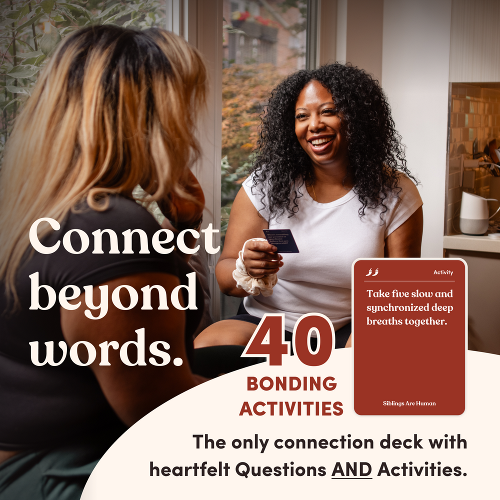 Two people talking indoors, one holding a Siblings Are Human card, headline “Connect beyond words.”