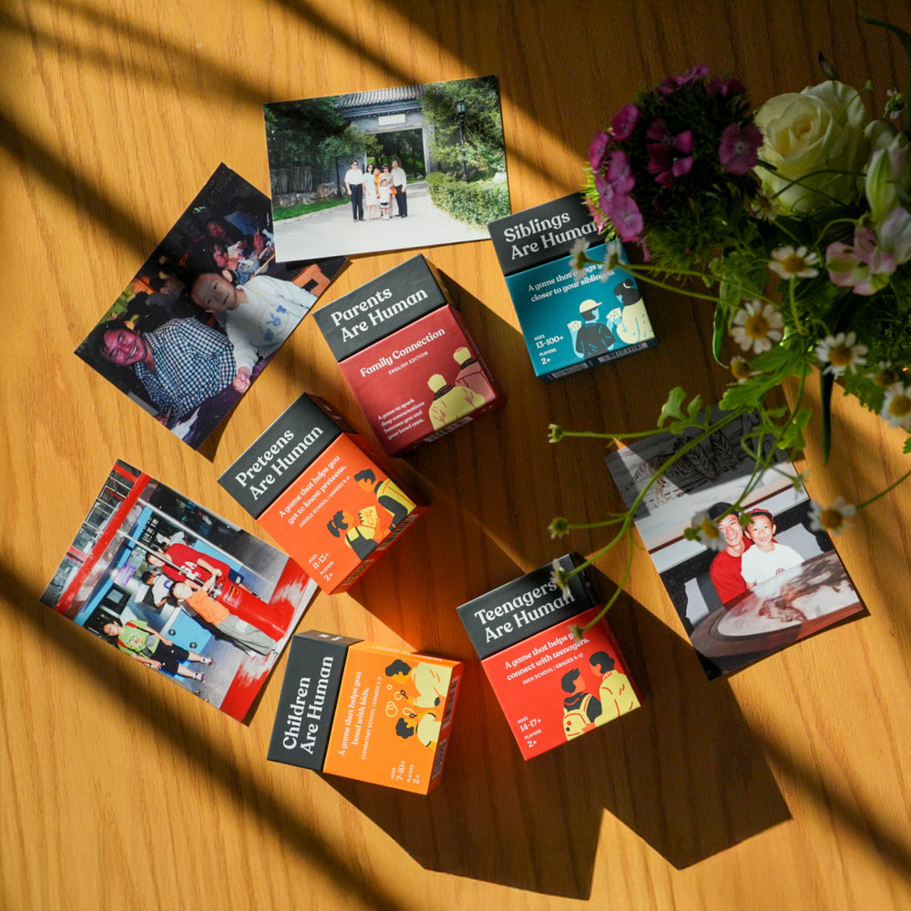 Children, Preteens, Teenagers, Parents and Siblings Are Human decks on a sunlit wooden table with old family photos